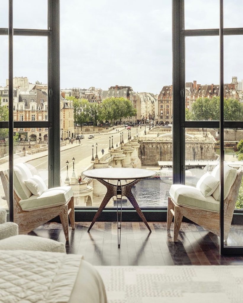Hotel room at the Cheval Blanc Paris overlooking the streets of Paris.