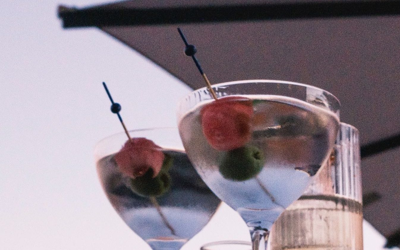 Two martinis with olives and in glasses at the Bar Blondeau in New York City.