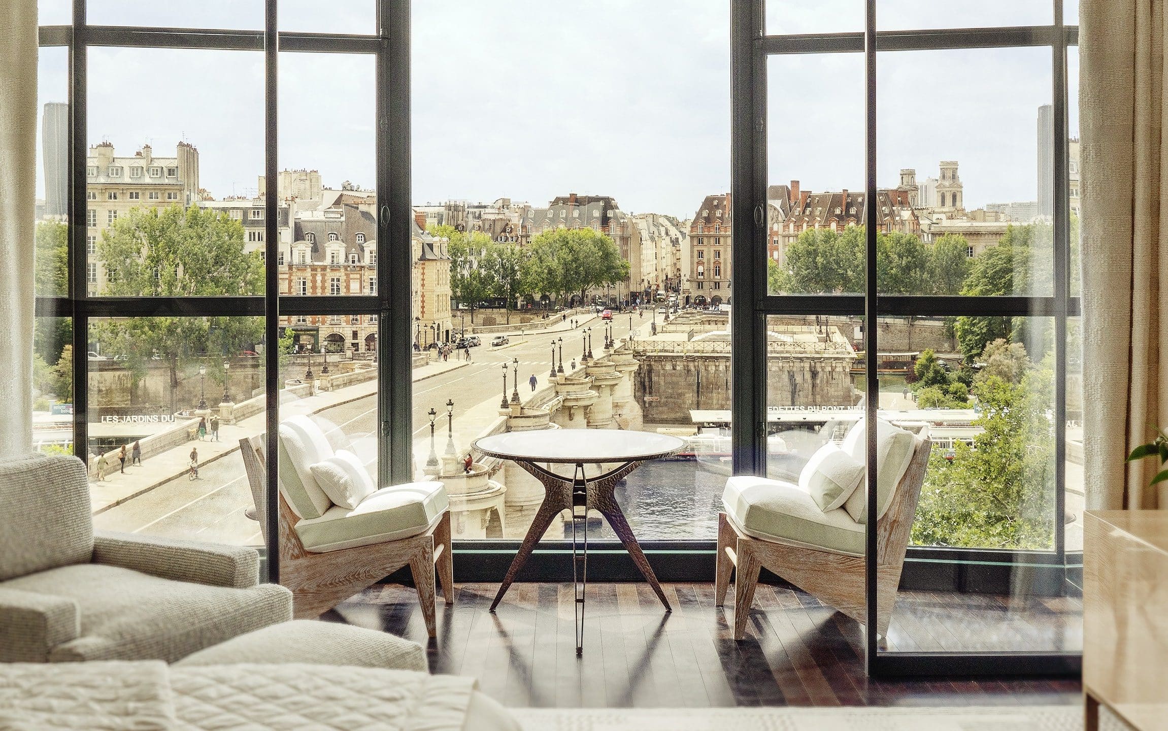 Hotel room at the Cheval Blanc Paris overlooking the streets of Paris.