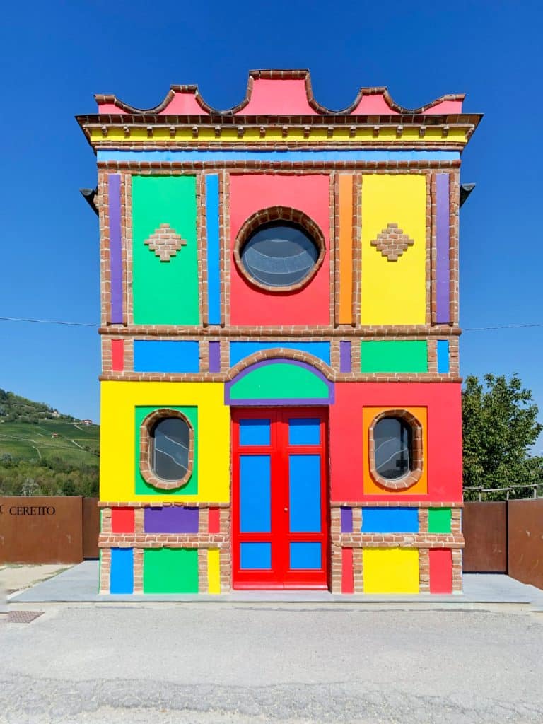 Building in Italy with various brightly colored areas.
